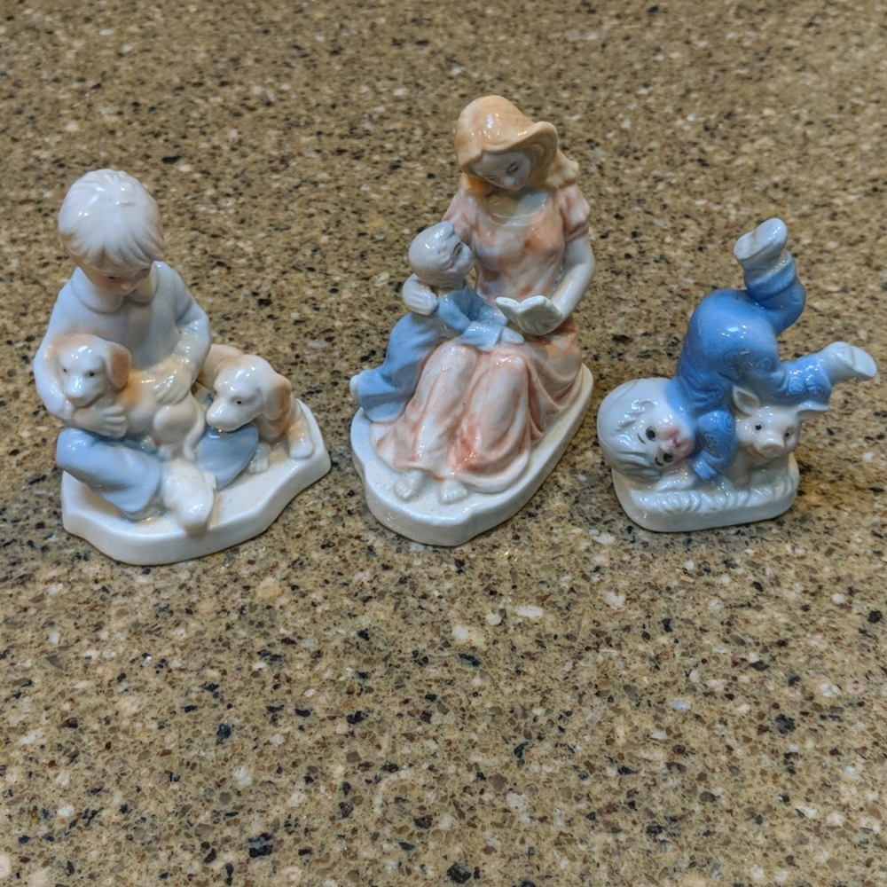 Mother, son, pig, book, dog figurines lot